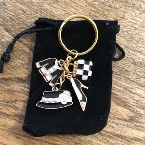 NWOT Stunning enamel and pearl gold keychain out on the town